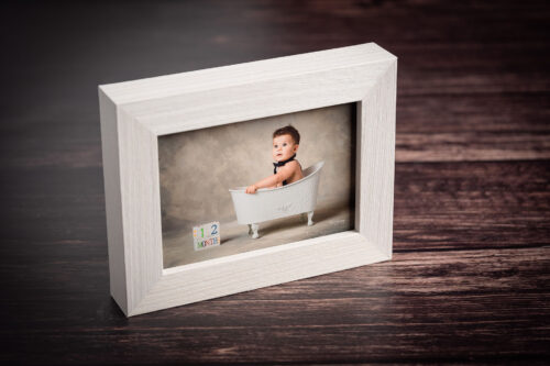 Cornice in legno 1600